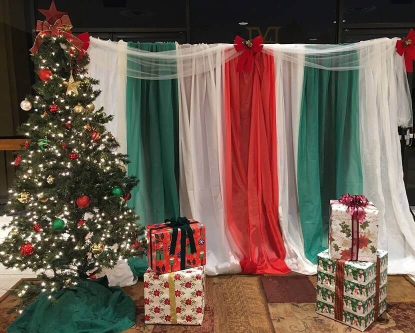 Lovely Christmas Backdrop Decor With Curtains, Chiffon Bolt, Ribbons, And Fairy String Lights