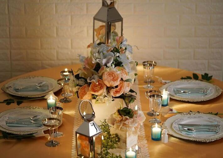 Ethereal Spring Tablescape Using Overlay, Runner, Lanterns, Planter Box, Flowers & Candle Holders