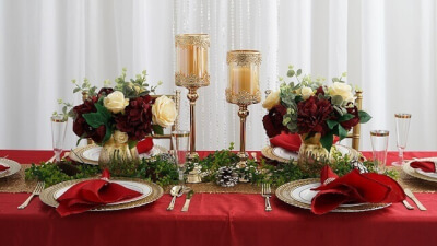 Christmas Dinning Table Décor With Candle Holders, Vases, Pinecones, Leaf Garland, Flutes, & Floral