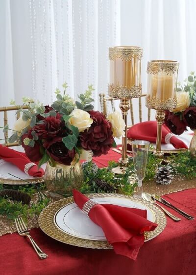 Luxurious Christmas Table Décor With Hurricane Vases, Flowers, Pinecones, Flutes, & Candle Holders