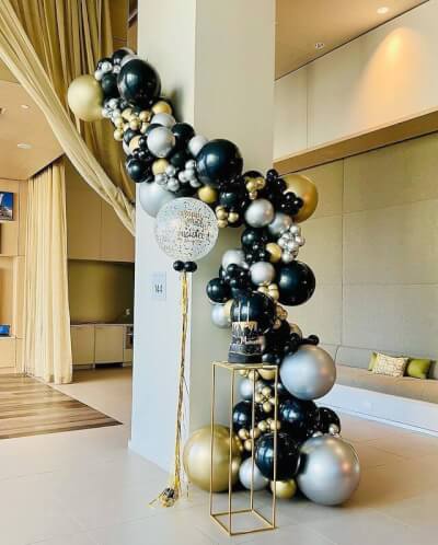 Glamorous Balloon Birthday Décor With Foil Fringe, Flower Stand, Confetti & Vinyl Balloons