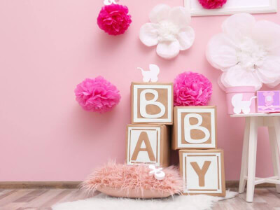 Elegant Baby Shower Décor With Paper Flowers, Pom Poms, Sheepskin Rug & Balloon Boxes