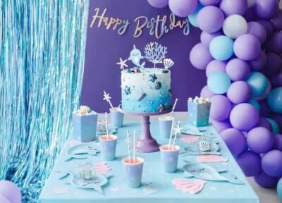 Enchanting Under The Sea Themed Birthday Décor With Foil Fringe Curtains, Balloons & Tablecloth