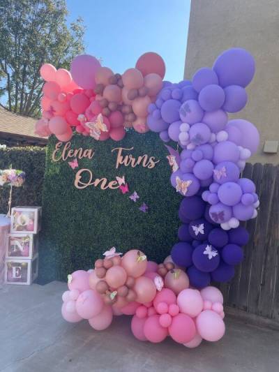 1st Birthday Backdrop Décor With Grass Wall, Butterflies, Acrylic Boxes, Metal Vase, & Balloons