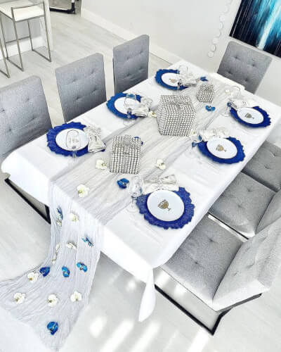 "Gleaming Tabletop Decor With Tablecloth, Table Runner, Orchid Heads, Chargers, Napkins, & Rings
