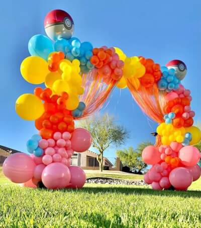 Vivacious Party Backdrop Featuring Backdrop Stand, Curtains, & Colorful Balloons 