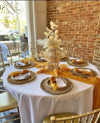 Elegant Table Setting With Tablecloth, Table Runner, Flowers, Pampas Grass, Placemats, & Napkins