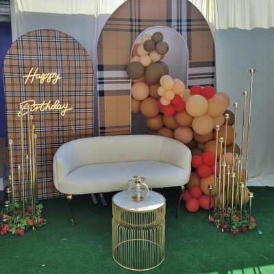 Outdoor Birthday Party Backdrop With Round Top Frames, Candelabras, Garlands, LED Sign, & Balloons