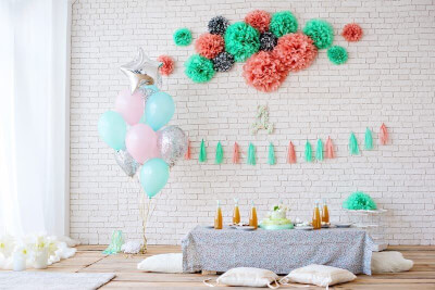 Pastel Celebration with Paper Fringes, Assorted Flowers, Tablecloth, Balloons, and Paper Dinnerware