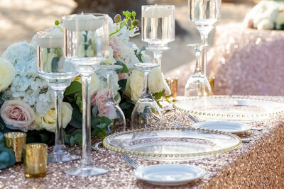 Chic Table Setup Using Tablecloths, Charger Plates, Floral Decors, Candle Holders & Candles