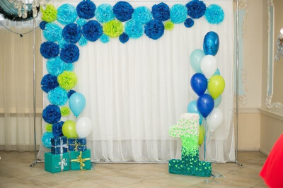 Simple Child’s Birthday Backdrop using Curtains, Kissing Balls and Balloons