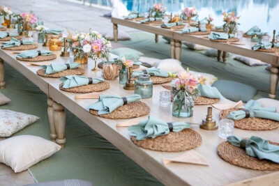 Exceptional Wedding Table Setup with Table Napkins, Placemats, Jars, Flowers and Pillow Covers