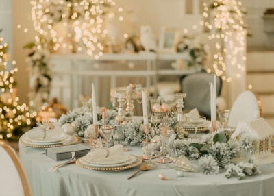 Enchanting Wedding Table Setup Using Tablecloth, Table Napkins, Candles, Flowers & Fairy Lights