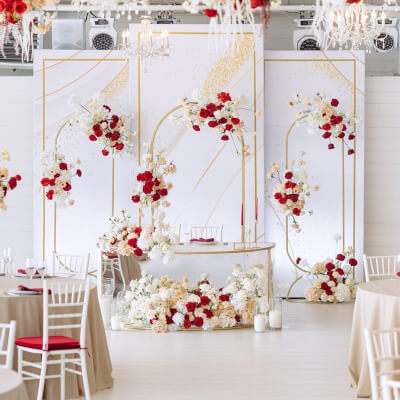 Red & White Wedding Decor With Arch Stands, Tablecloth, Seat Pads, Candles, Vases, & Flowers
