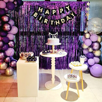 Purple Themed Birthday Decor With Fringe Curtains, Column Stand, Cake Stand, Cake Topper, & Balloons