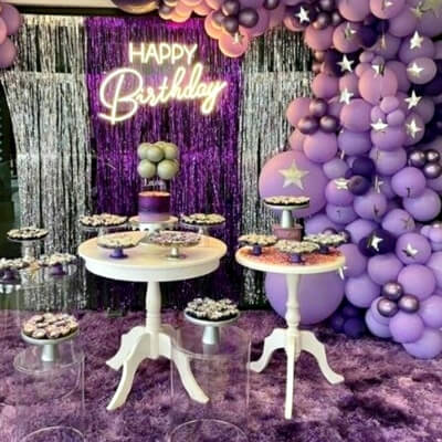 Jazzy Birthday Decor With Foil Curtains, Pedestal Risers, Cake Stands, Star Chains, & Balloon Garlan