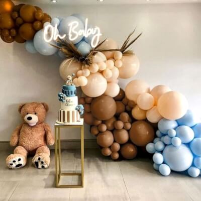Enticing Baby Shower Decor With Light Sign, Column Stand, Plexiglass, Dry Grass, & Balloon Garland