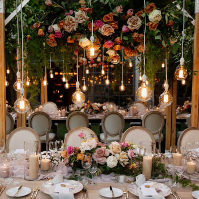 Splendid Dinner Table Setup With Tablecloths, Runners, Candles, Flowers, Vases, & Lighting