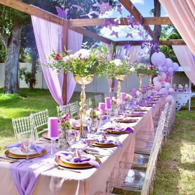 Whimsical Outdoor Dining Experience With Table Cover, Runner, Napkins, Dinnerware, & Candles