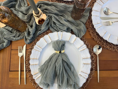 Rustic Gray Tablescape With Geometric Placemats, Gold Accents & Elegant Napkin Detailing