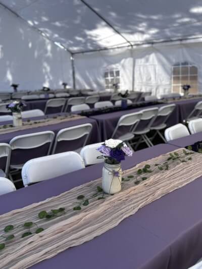 Whimsical Tent Décor with Lilac Linens, Cheesecloth Table Runners, and Mason Jar Florals