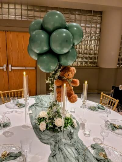 Soft Sage Celebration with Teddy Bear Balloon Centerpiece, Sage Runner, and Crystal Dinnerware
