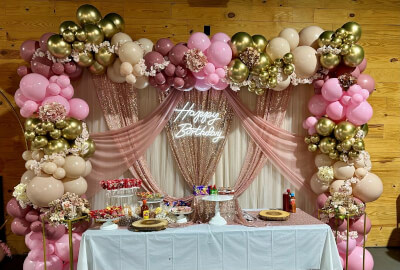 Glam Candy Bar Birthday Display with Gold-Pink Balloons, Sequin Curtains, and Rustic Dinnerware