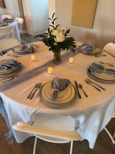 Timeless Charm with Classic Gray-and-White Tablescapes, Candlelit Glow, and a Chic Floral Arrangemen
