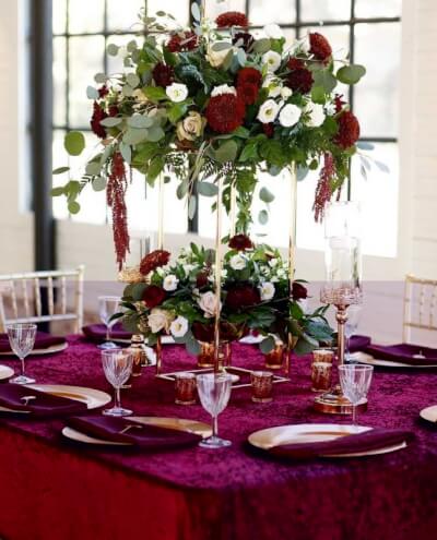 Burgundy Velvet Meets Gold Luxe with Rose Centerpieces, Rich Linens & Candlelit Glow