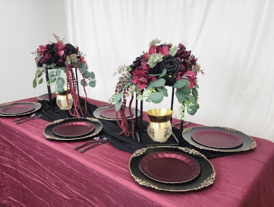 Glamorous Burgundy Table Setting with Black Runners, Baroque Chargers & Bold Florals