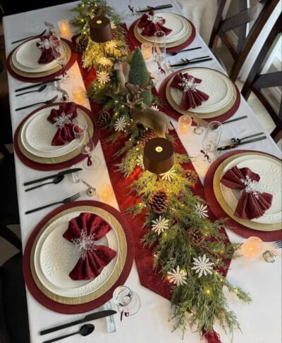 Winter Woodland-Inspired Table with Red & Gold Palette, Pinecone Garland & Snowflake Accents